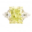 Rahaminov Platinum 3-Stone Radiant Cut 5.73 Carat Fancy Yellow Diamond Ring