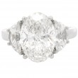 Platinum Three-Stone 3.07 Carat Oval Diamond Engagement Ring